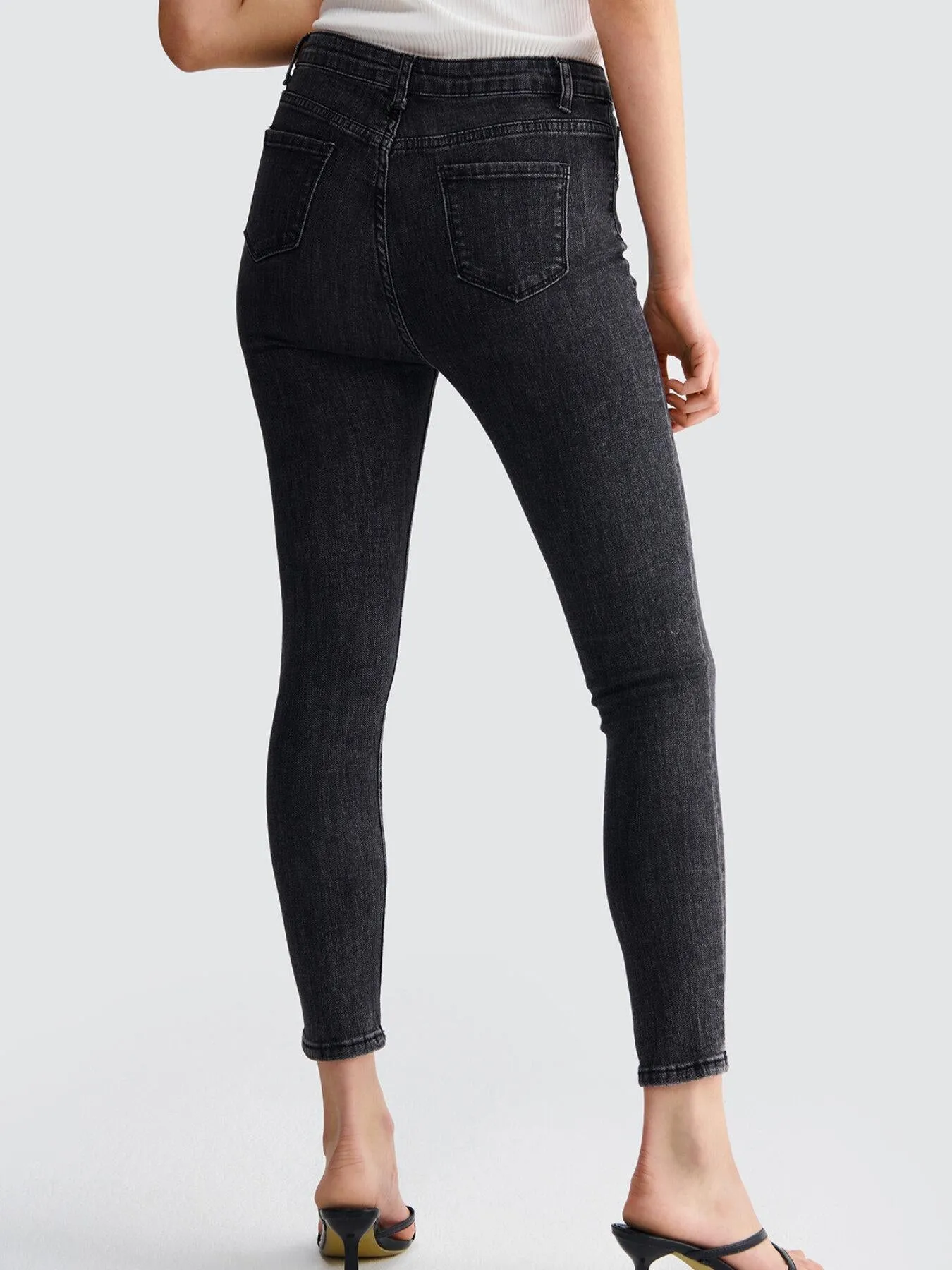 Button Pocket Raw Wash Skinny Jeans